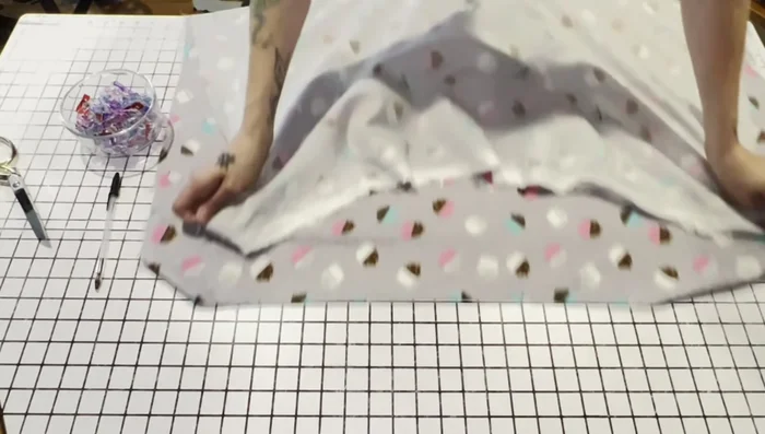 Pin crinkle paper to both sides of the flannel rectangle.