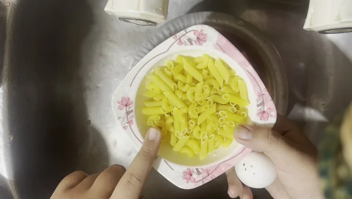Cook Macaroni: Boil macaroni until cooked through.