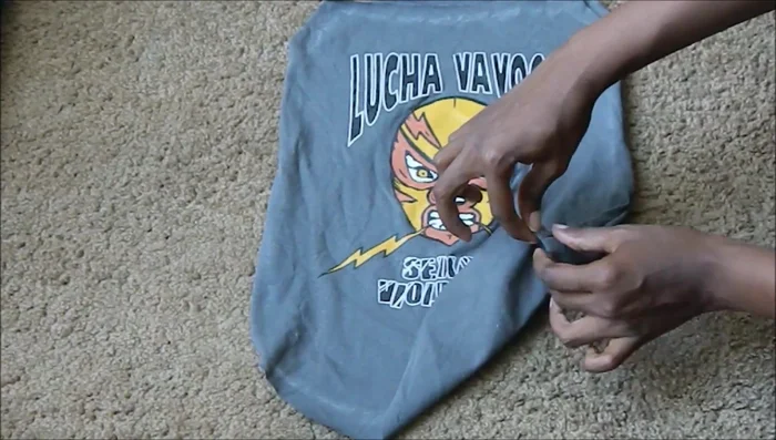 Sew the sides of the front and back pieces together. Fold the bottom twice, press (or pin), and stitch to create a hem.