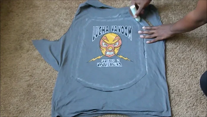 Sew the sides of the front and back pieces together. Fold the bottom twice, press (or pin), and stitch to create a hem.