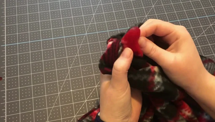 Add velcro to the sides of the collar.