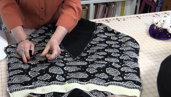 Using a walking foot (or hand-sewing), stitch around the pinned edges with larger stitches than usual. Sew all the way around, including the small triangular gap.