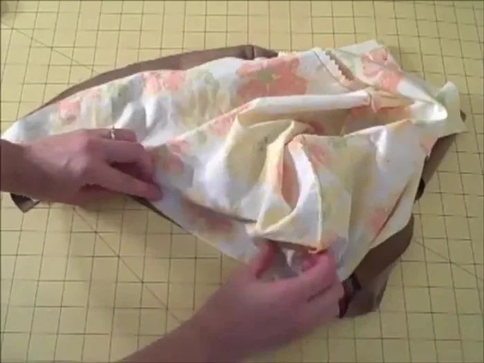 Place the outer and lining right sides together and sew all the way around, leaving a 5-inch opening in the bottom. Clip or trim the seam allowances and turn right side out through the opening.