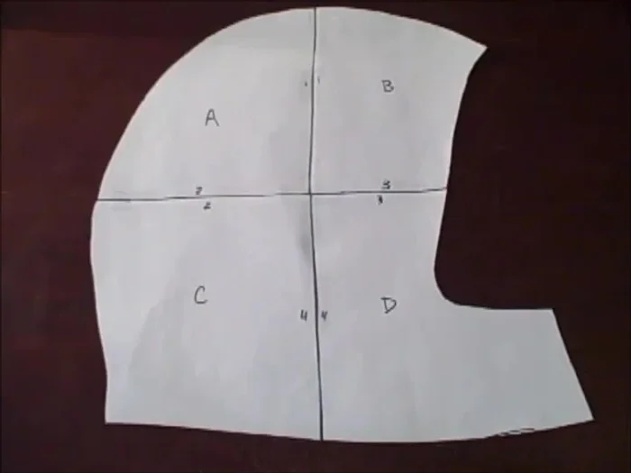 Fold your fabric right sides together and place the pattern on top. Cut around the pattern, repeating with the lining fabric.