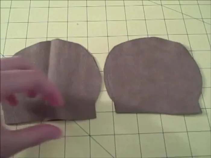 Line up the bottom of the ear with the opening, pen, and sew to attach the ears.