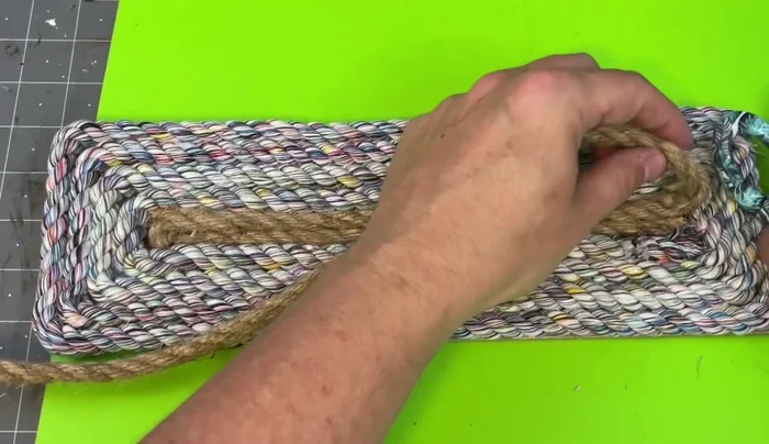 Glue white wooden beads to the bottom of the tray.