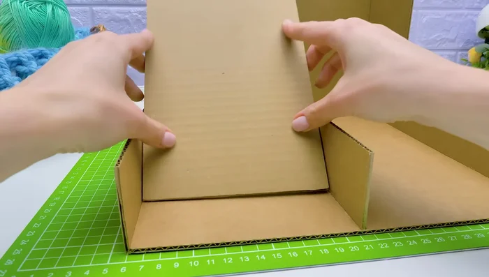 Create a slide for the cat food. This will allow the food to reach the bowl automatically.