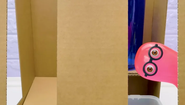 Cover the bottle and the food section with transparent plastic. This allows visibility of food and water levels.