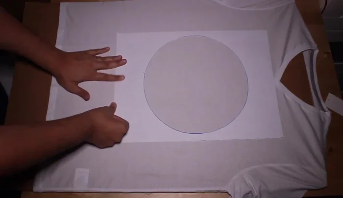 Create a paper stencil of a cat. (Avoid using contact paper as it's difficult to work with).