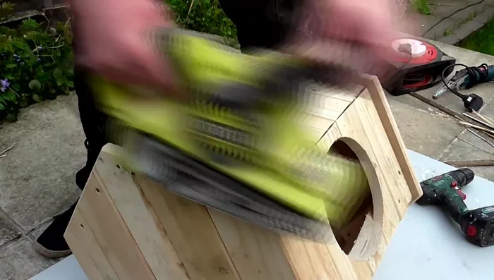 Sand the entire cat house (120 grit, belt sander, electric file, hand sanding, orbital sander).