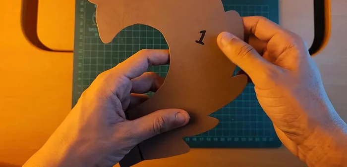 Attach the tail to the waist strip.