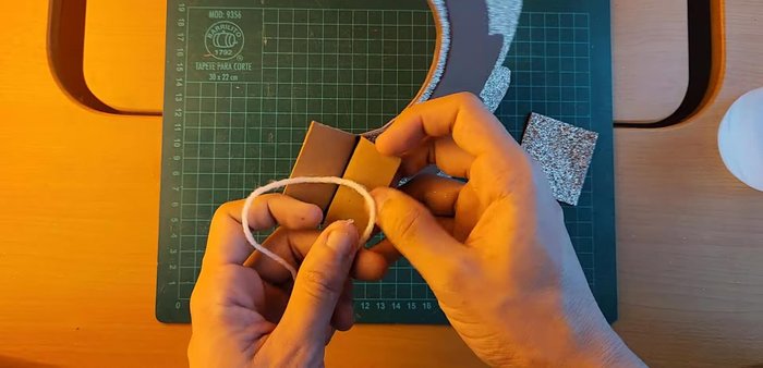 Attach the tail to the waist strip.