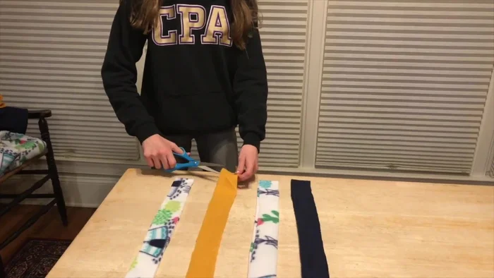 Cut each 60-inch strip in half to have four pairs of 30-inch strips.