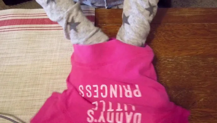 Select a pre-owned child's shirt (12-18 months size suggested). Turn it inside out.