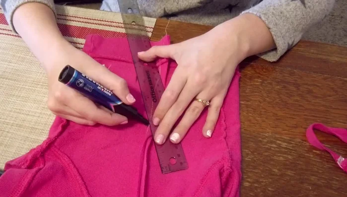 Cut off the excess fabric. Try the shirt on again and make any necessary adjustments.