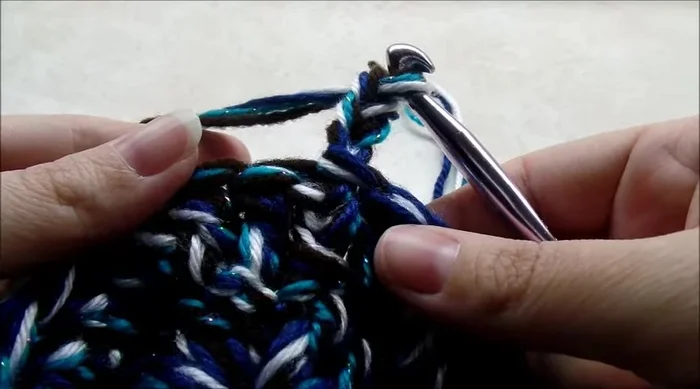 Round 3: Chain three. *One double crochet in the next stitch, two double crochets in the next stitch*. Repeat from * to * around (total 36 stitches). Slip stitch to the top of the chain three.