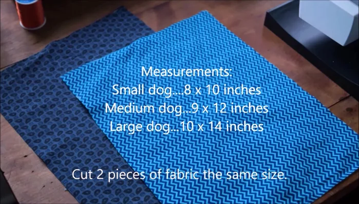 Fold your fabric in half vertically and iron, then in half horizontally and iron again.