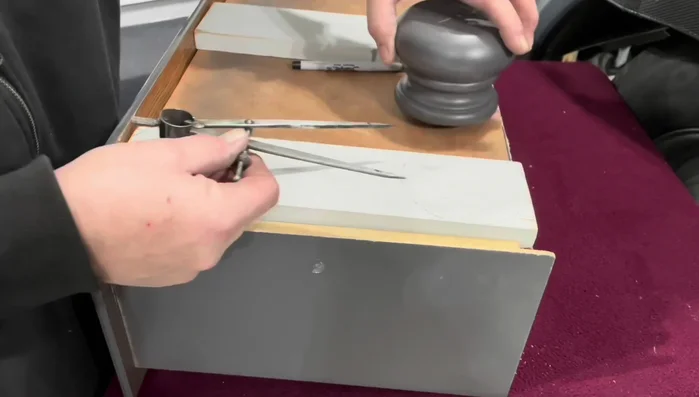 Attach the feet using calipers to measure and long screws.