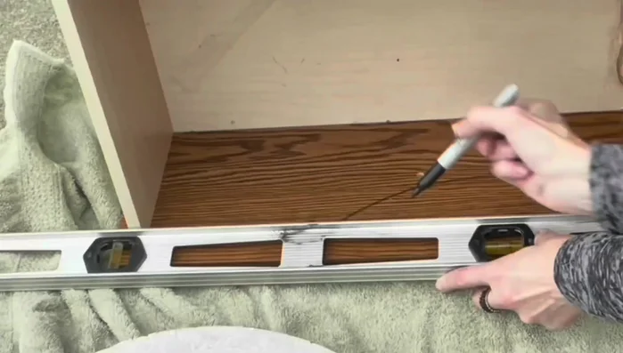 Use scroll saw to even out asymmetrical sides, then sand again.