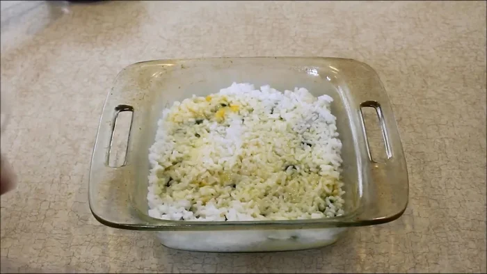 Sprinkle 0.25 cups of grated cheese (mozzarella suggested) on top.