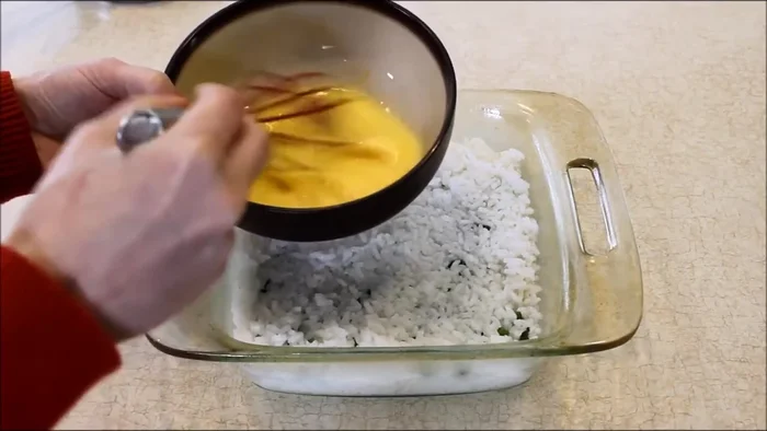 Sprinkle 0.25 cups of grated cheese (mozzarella suggested) on top.