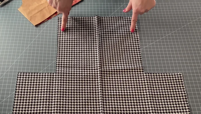 Pin and cut the back piece. Adjust the back piece (if irregularly shaped) to fit the bodice pattern.