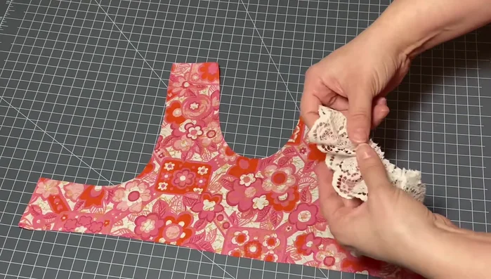 Sew the lace to the bodice: Stitch along the edge, securing both the lace and the bodice fabric. Trim excess lace.