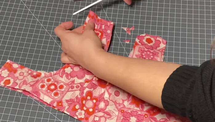 Finish the bodice: Cut corners and notches to reduce bulk, turn right side out, and press.