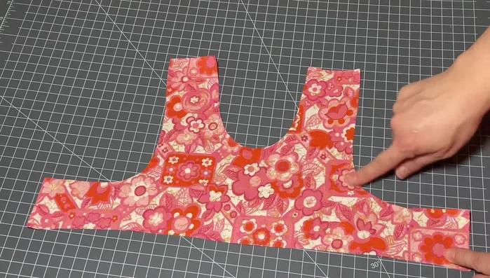 Gather the lace: Use a sewing machine with the largest stitch size and highest tension to create gathers. Alternatively, manually gather using the loose threads.