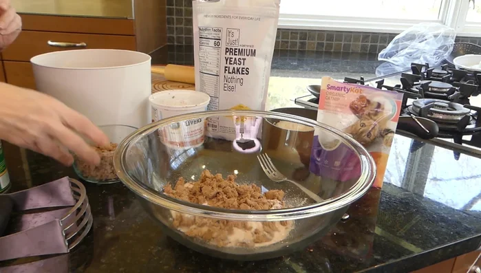 Knead the dough until it forms a cohesive mixture.