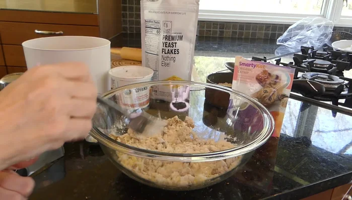 Knead the dough until it forms a cohesive mixture.