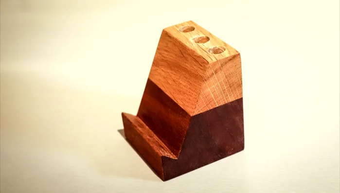 Reinforce the leg attachments by drilling pilot holes and driving screws from the inside of the cat houses.