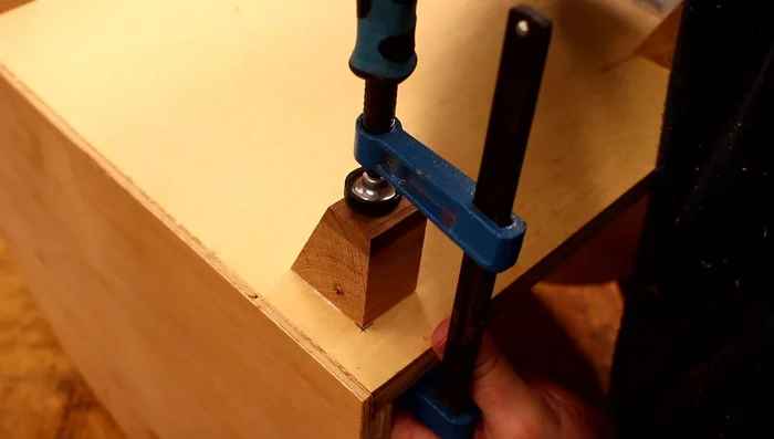 Reinforce the leg attachments by drilling pilot holes and driving screws from the inside of the cat houses.