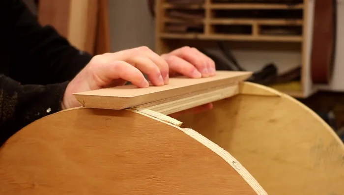 Glue the cladding pieces onto the cat houses using gap-filling adhesive (Grip fill or similar), securing with brads.