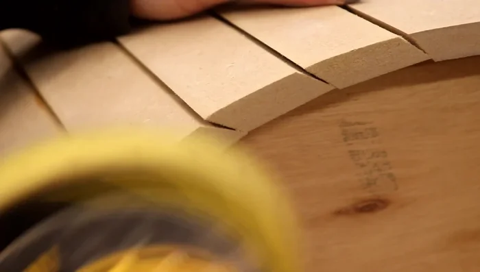 Fill nail holes with wood filler, sand (120 grit, then 400 grit), and paint the cladding.