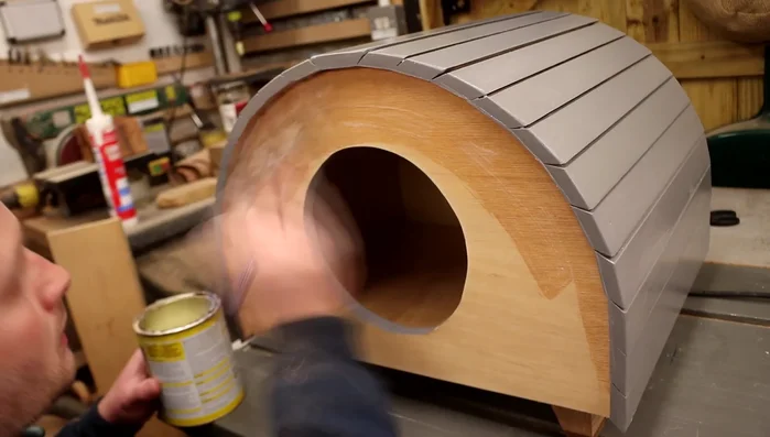 Apply a topcoat of varnish (water-based and acrylic spray) to protect the paint, sanding with 400 grit between coats. 