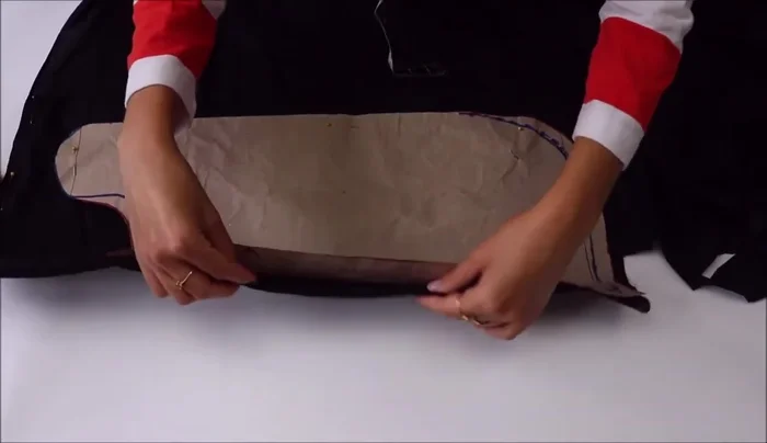 Cut fabric: Fold fabric to fit pattern, pin and cut. Cut two separate underbelly straps. Repeat for lining and interfacing.