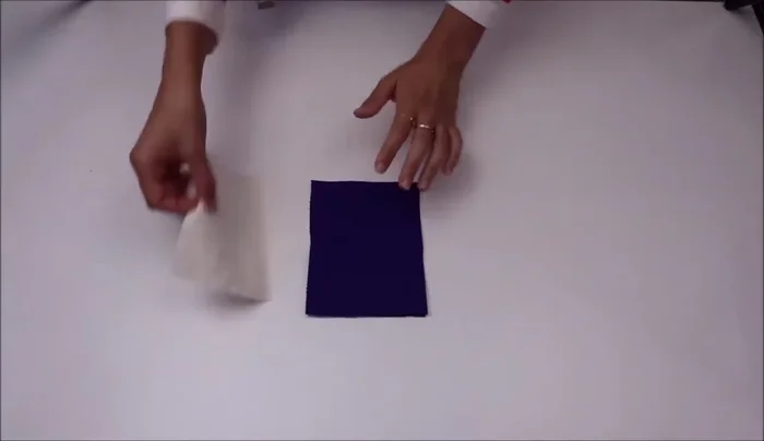 Create the outer layer: Layer outer fabric (right side up), lining (right side up), and wadding (on top of lining). Sew three sides, leaving the top edge open. Clip corners.