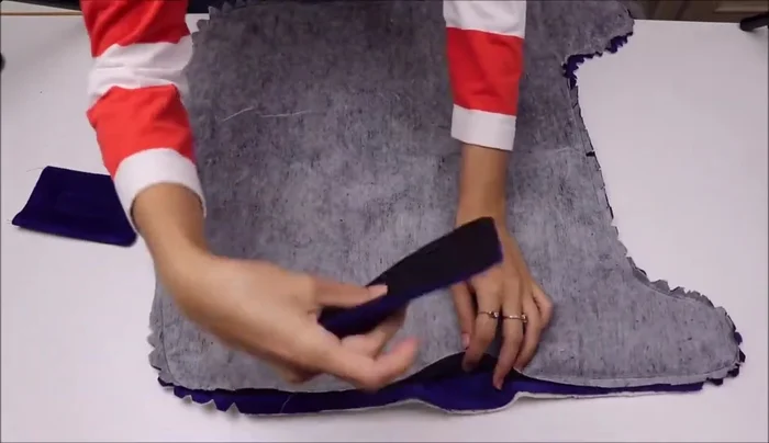 Sew in straps: Pin straps to coat body (outer strap to outer fabric). Sew the straps into place.