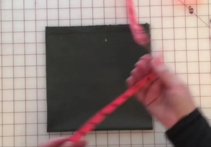 Cut along the chalk mark to create a perfect circle.