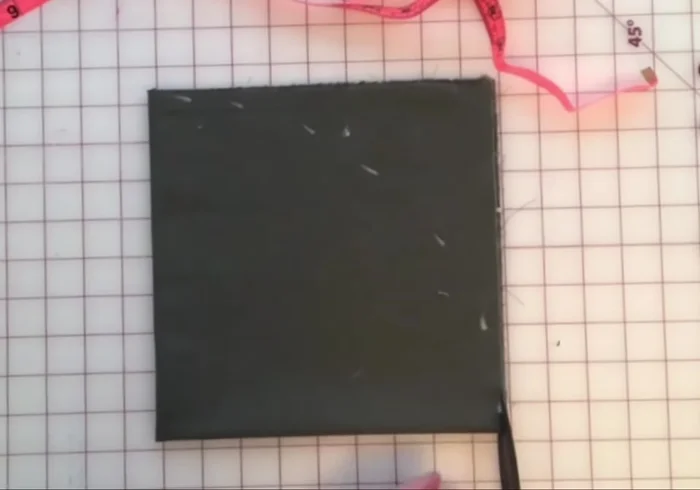 Cut along the chalk mark to create a perfect circle.