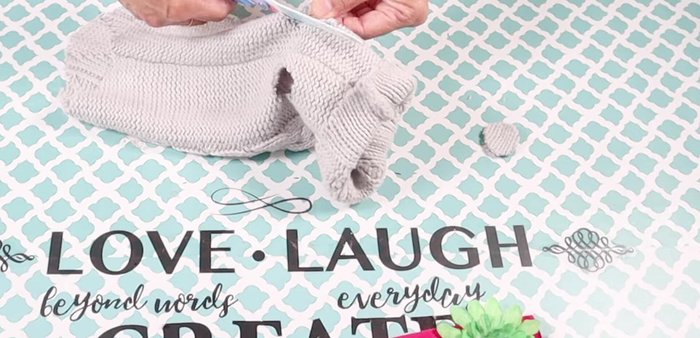 Repeat steps 3 to create leg openings on the sweater top.