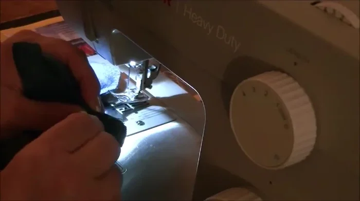 Close the opening by folding the edges under and pinning. Sew with a zig-zag stitch for durability. 