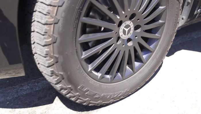 Powder coat the rims black to prevent dirt, and install all-terrain tires for off-road capability.