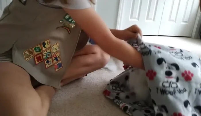 Fill the blanket with stuffing or foam (avoid for donation).