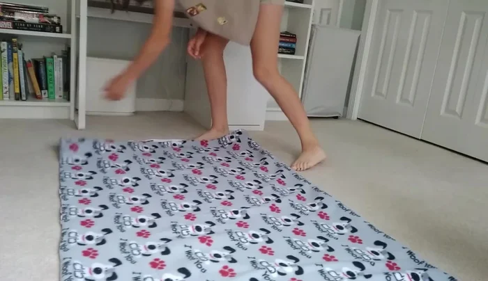 Cut off the corners of both felt pieces (5 inches by 5 inches).