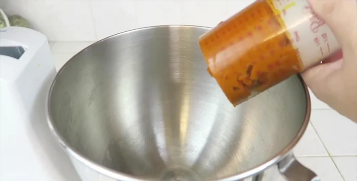 In a mixing bowl, combine 1 cup of 100% pure pumpkin, 1 teaspoon of cinnamon, and 1 egg. Mix well until blended.