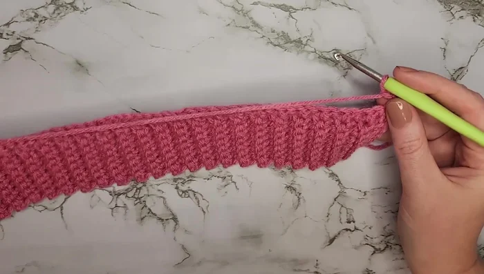 Row 7: 58 half double crochets across.