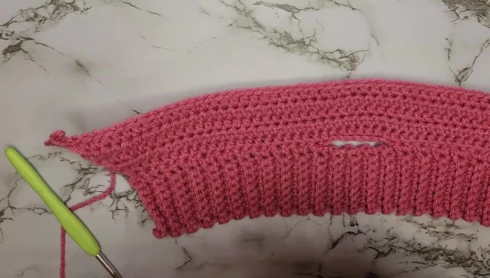 Row 7: 58 half double crochets across.