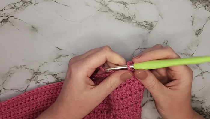 Rows 9-25: Repeat row 9 (58 half double crochets across).